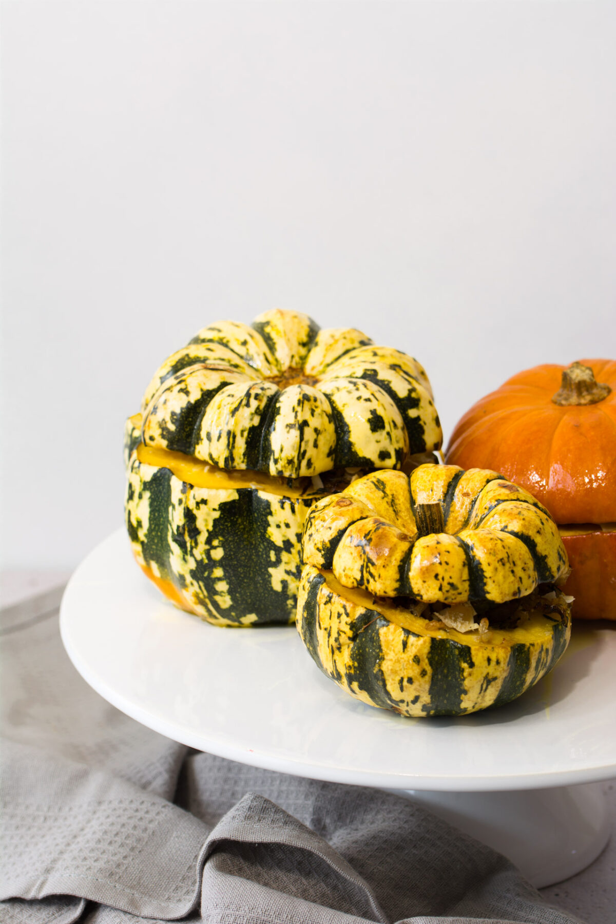 Beautiful Butternut Squash stuffed with Brown rice, brussels sprouts, cranberries and feta cheese.