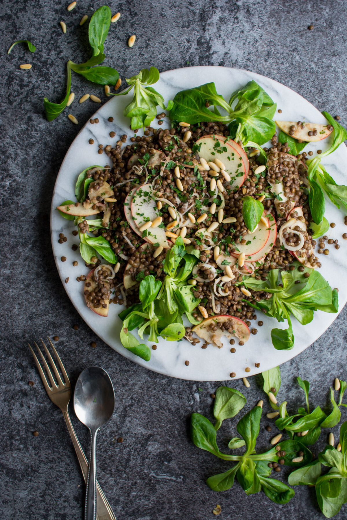 A delicious black lentil and apple salad, with a red wine vinaigrette and toasted pine nuts