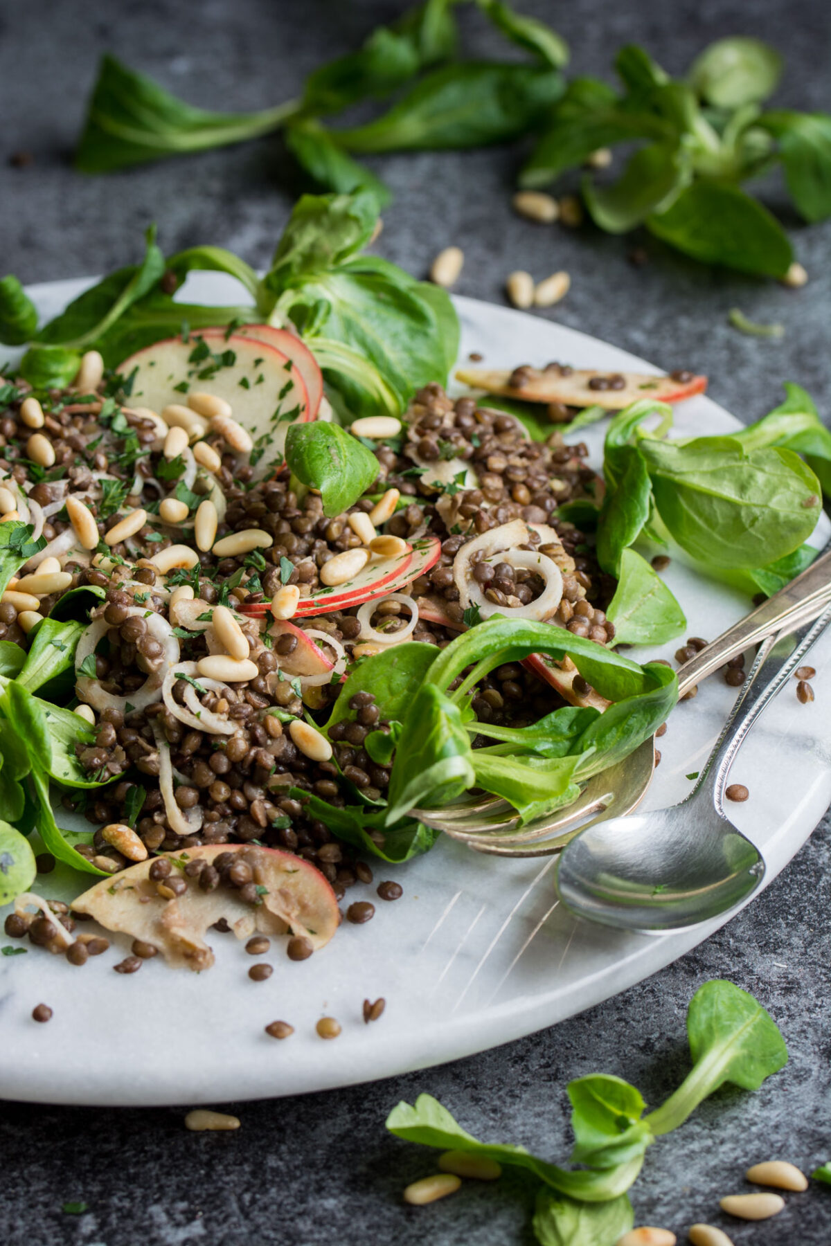 A delicious black lentil and apple salad, with a red wine vinaigrette and toasted pine nuts
