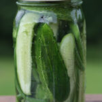 Pickles cucumbers and garlic scapes